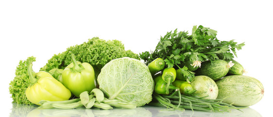 fresh green vegetables isolated on white
