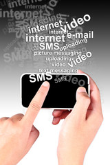 Hand touching smartphone