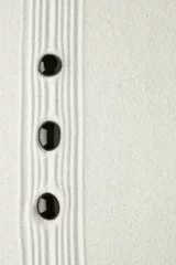 Fotobehang Zen Stenen Zwarte stenen in zand  © Leigh Prather