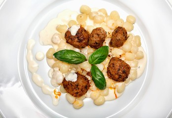 The original gnocchi with cheese sauce and meatballs