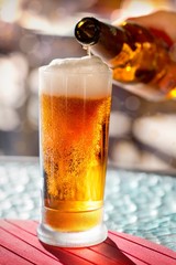Beer pouring into glass