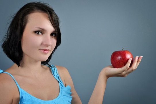 woman with red apple