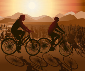 Obraz premium Biking Couple Enjoying Sunset View