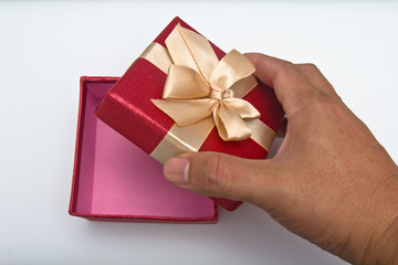 red gift box with hand