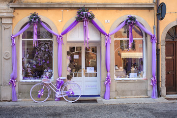 Purple bike next to a lavender shop