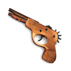 Toy wooden gun , on a white background