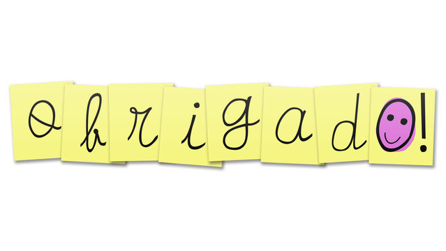 Palavra "obrigado" feita com autocolantes