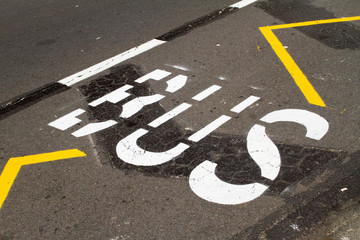 Bus text on the ground