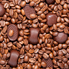Chocolate candies in coffee beans. Delicious and sweet life
