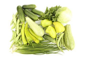 fresh green vegetables isolated on white