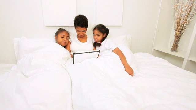 Ethnic Single Mother Children Bedroom Wireless Tablet