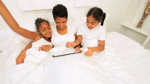Ethnic Mom Daughters Bedroom Morning Wireless Tablet