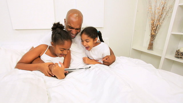African American Family Bed Wireless Tablet