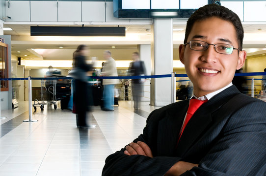Elegant latin business man at airport / office