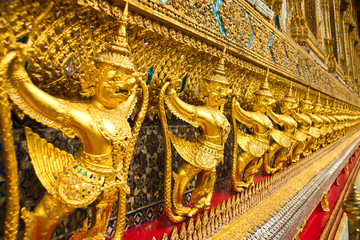 Golden garuda sculpture at Royal Palace in thai .