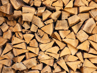Closeup of well stacked firewood usable as texture.