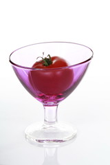 Red Tomato in pink glas
