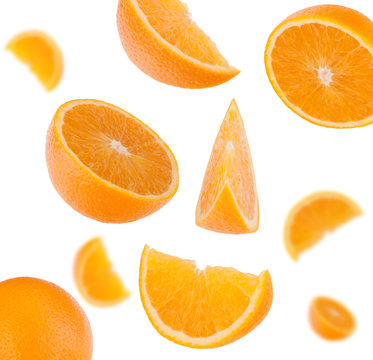 flying sliced orange fruit segments