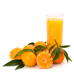 Tangerines and juice glass