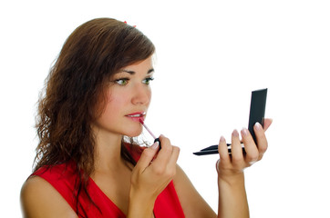 Woman with lipstick and mirror. Isolated on white