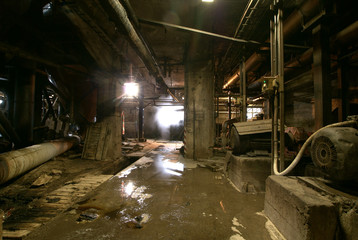 Old abandoned dirty empty scary factory interior
