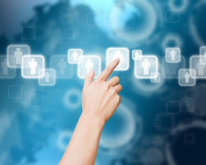 Hand of women pushing button on touch screen