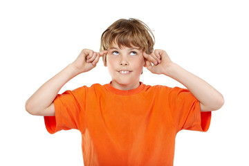 Portrait of smiling boy in orange t-shirt with rolled eyes