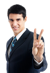 Businessman showing two fingers or victory sign