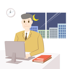残業をする中年男性