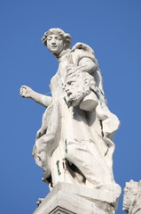 Fototapeta na wymiar Angel statue in Santa Maria della Salute Cathedral