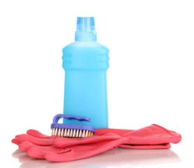 Detergent with brush and gloves isolated on white