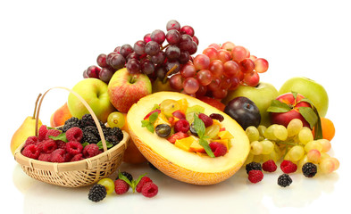 fresh fruits salad in melon, fruits and berries, isolated