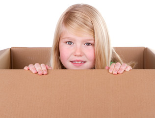 Child looking out of a box