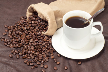 Coffee beans and coffee mugs