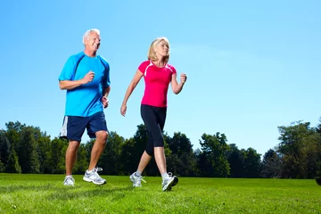 Afwasbaar Fotobehang Joggen Happy jogging couple.