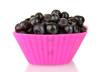 Fresh blueberries in colorful silicone mold isolated on white