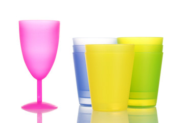Bright plastic tableware isolated on white