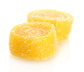 yellow jelly candies isolated on white.