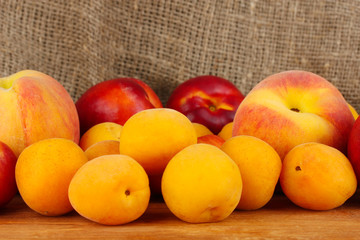 Ripe fruit on canvas background close-up