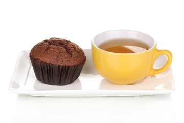 Fresh muffin with tea isolated on white