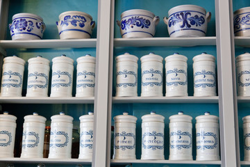 Ancient capacities with spices on shop regiments