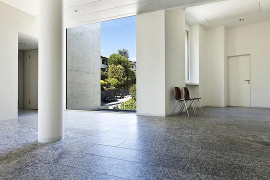 building interior, granite floor, white wall