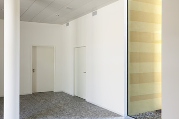 Fototapeta na wymiar building interior, granite floor, white wall