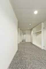 building interior, granite floor, white wall