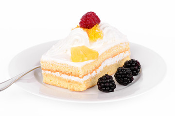 Cake with cream and raspberries.