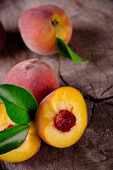 Fototapeta na wymiar Fresh peaches on wooden table