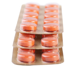 Pills on white background