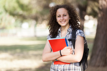 Young Beautiful Female Student at Park