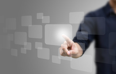 business hand pushing on a touch screen interface