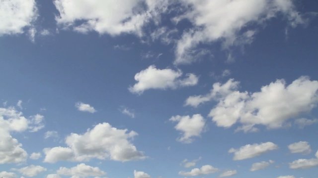 Accelerated blue fluffy cloudscape